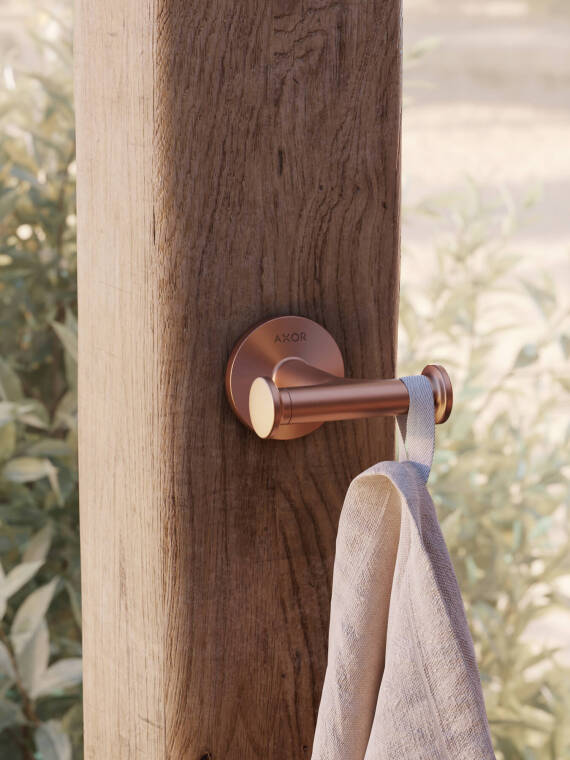 The AXOR Universal Circular towel hook in Brushed Bronze.