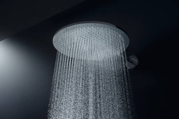 AXOR overhead shower. Nozzles on the circular plate retract.